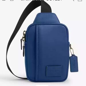 New with tag Coaxh Edge L Pack Blue Sling bag backpack